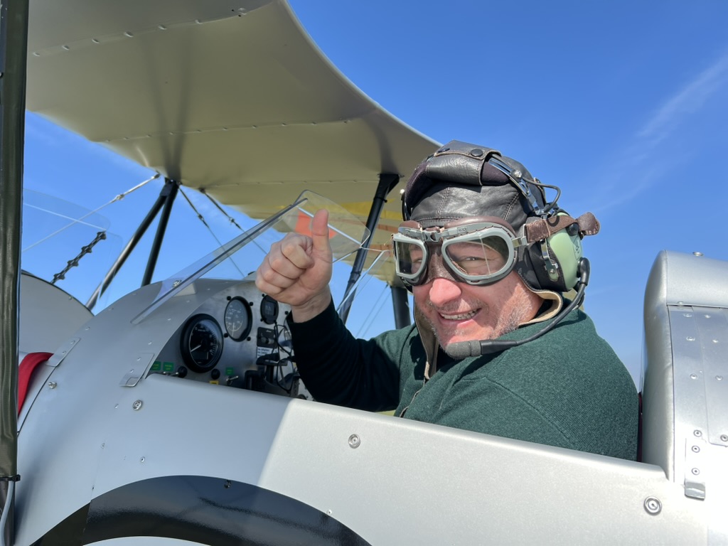 Stefano Vavassori in a biplane cockpit