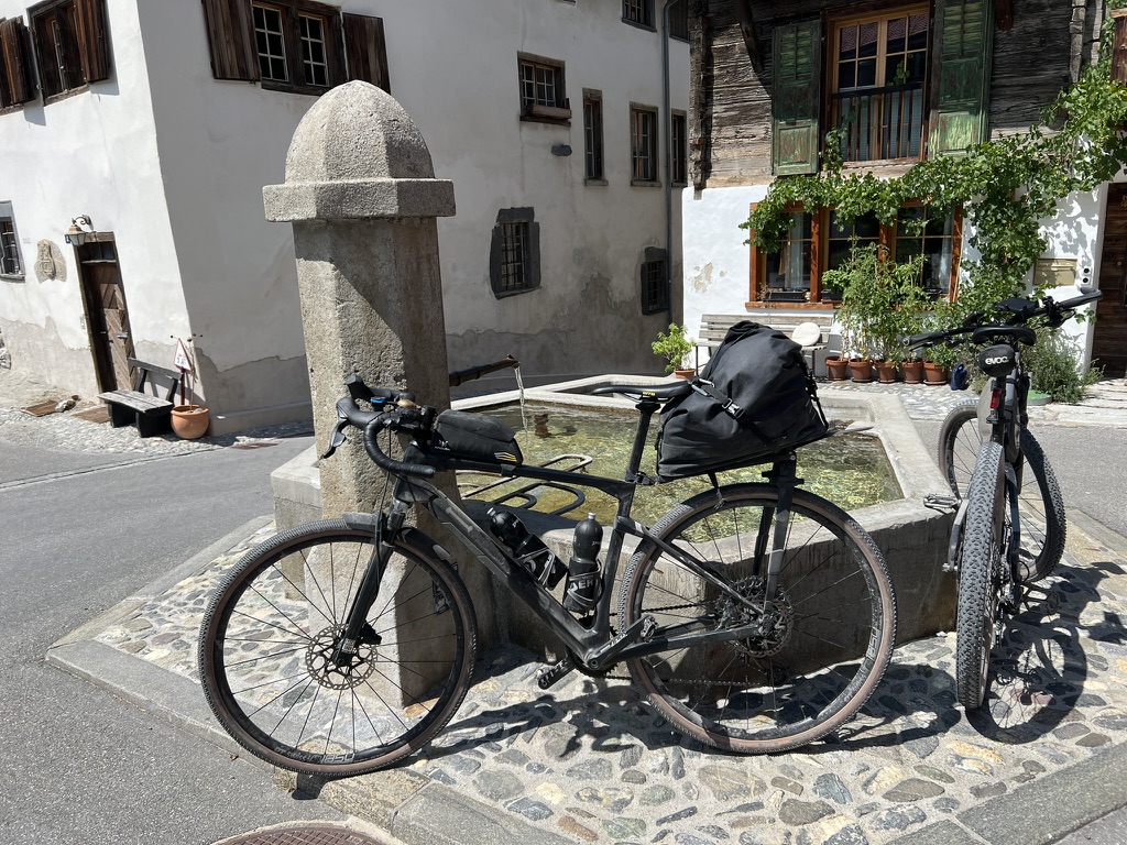 Gravel bike at an alpine fountain