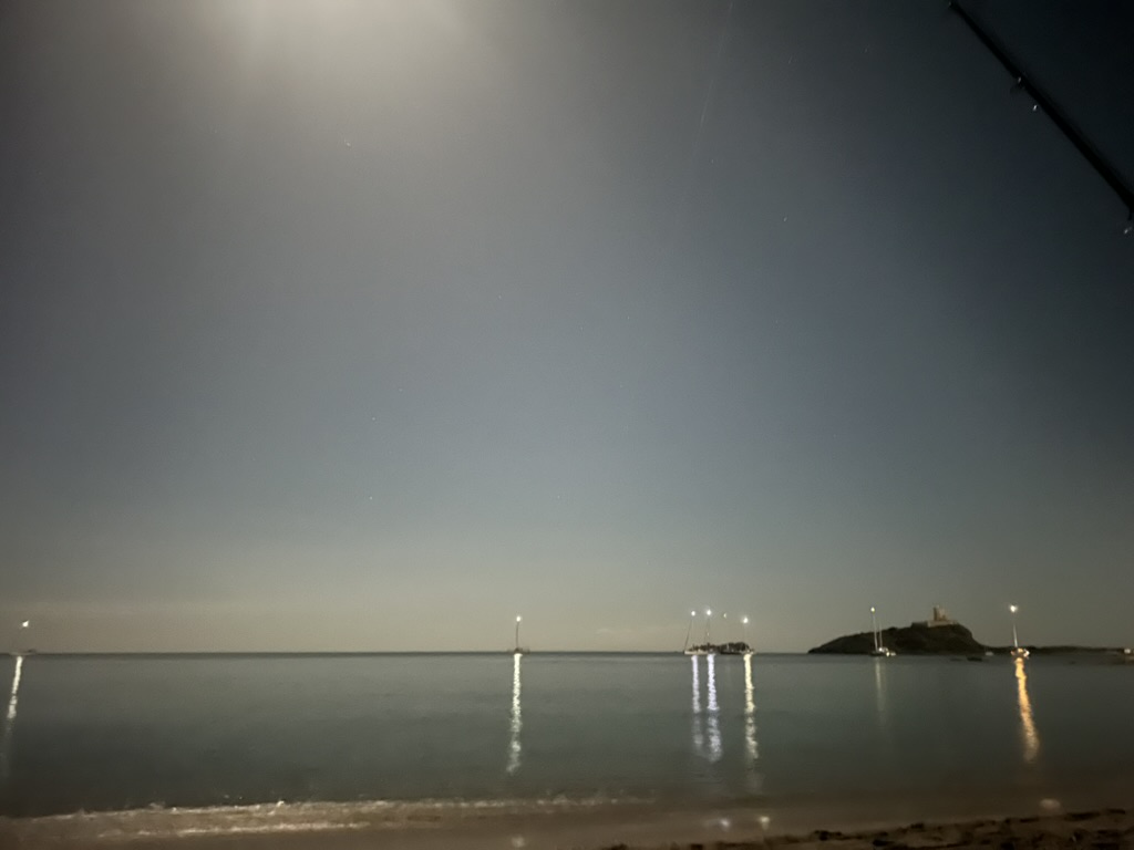 Night view of the sea with boat lights